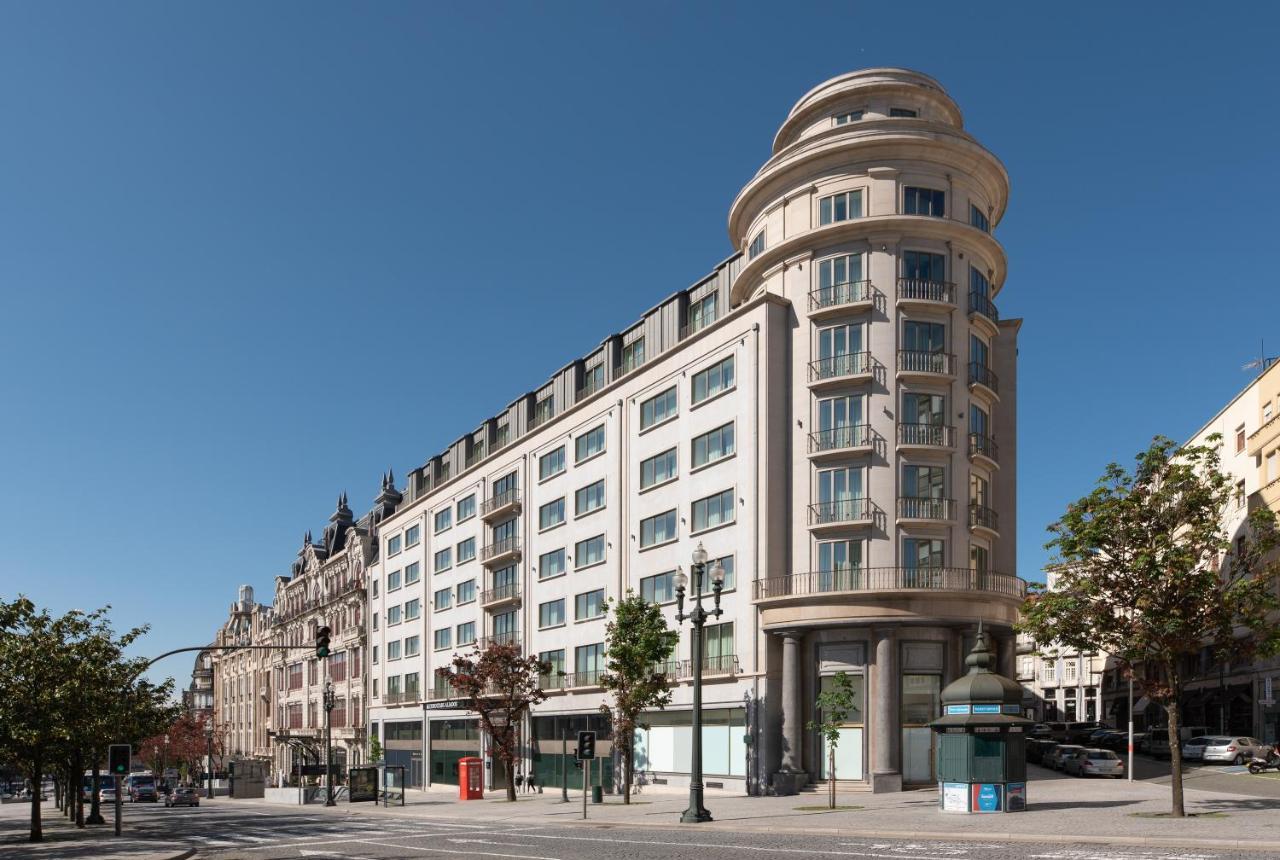 Eurostars Aliados Hotell Porto Eksteriør bilde The former department store, now apartments