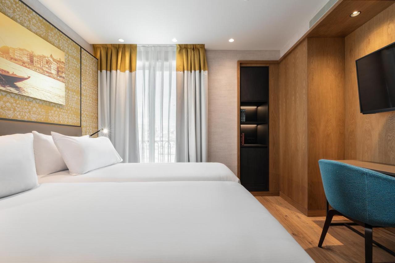 Eurostars Aliados Hotell Porto Eksteriør bilde A room at the hotel