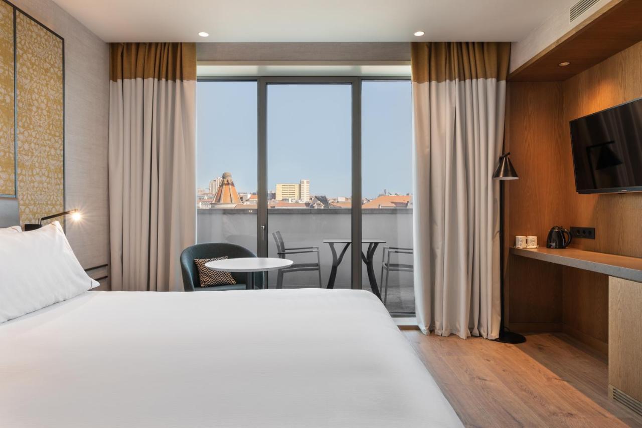 Eurostars Aliados Hotell Porto Eksteriør bilde Deluxe room with balcony